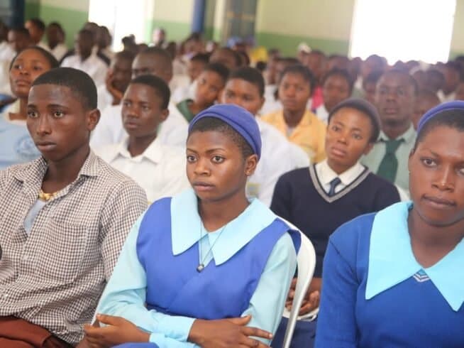 Secondary school students attending an education programme